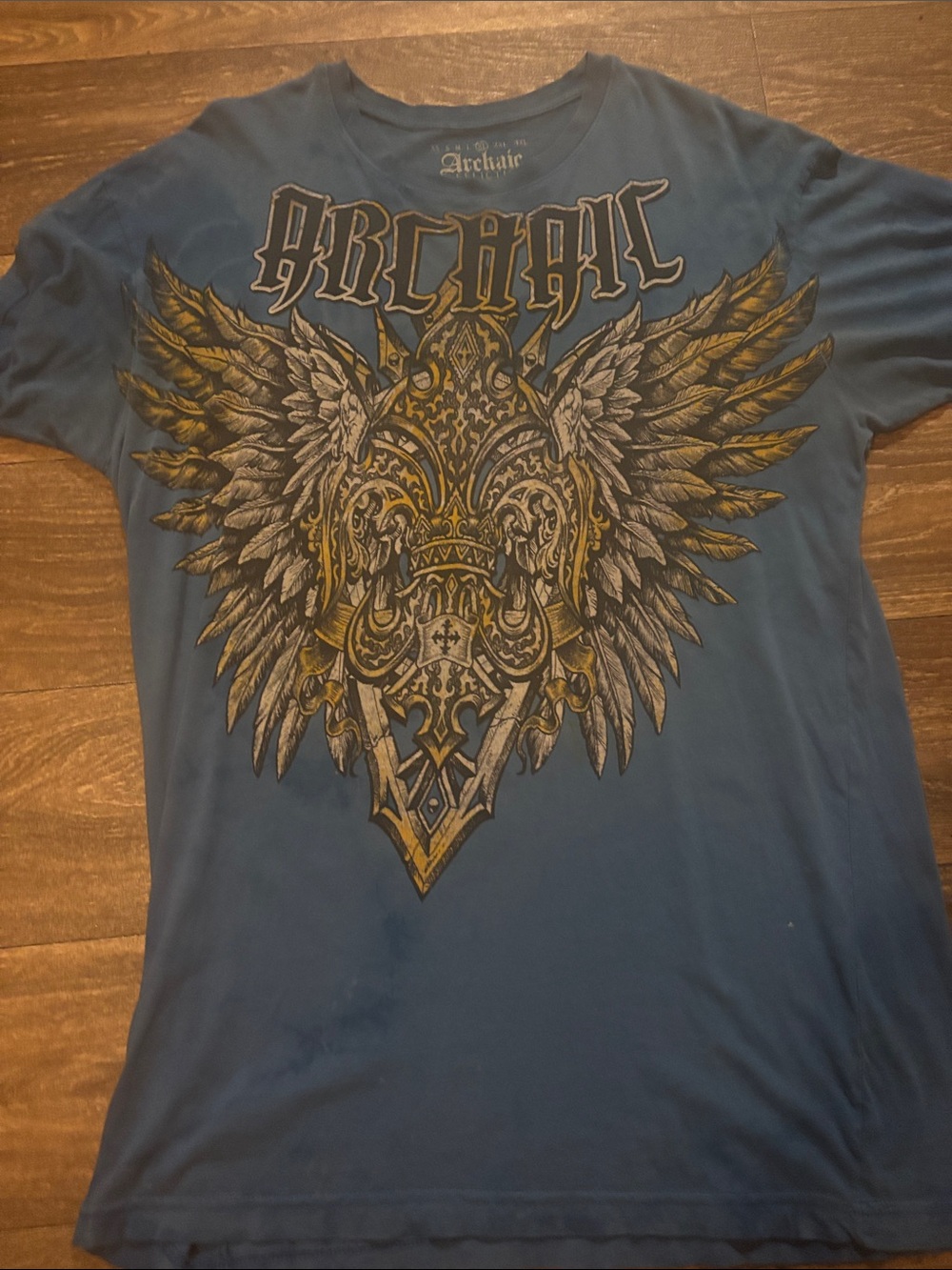 Archaic Blue Men’s T-Shirt with Gold and Gray Winged Crest